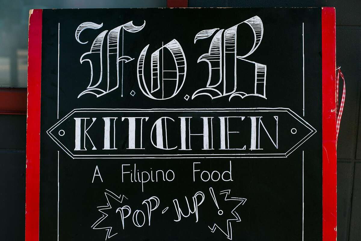 The outdoor sign welcoming guests to the pop up FOB Kitchen inside of Cease and Desist in the Misison District of San Francisco.