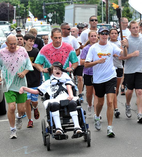 Milford officers join Special Olympics torch run (video)