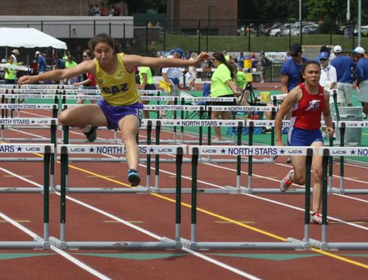 Cazenovia's Paige Bivano in the 100 high hurdles event of girls pentathlon.
