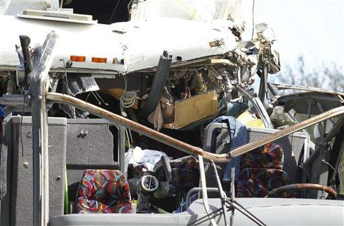 The front section of a bus that hit a concrete overpass at Miami International Airport.AP Photo/Wilfredo Lee