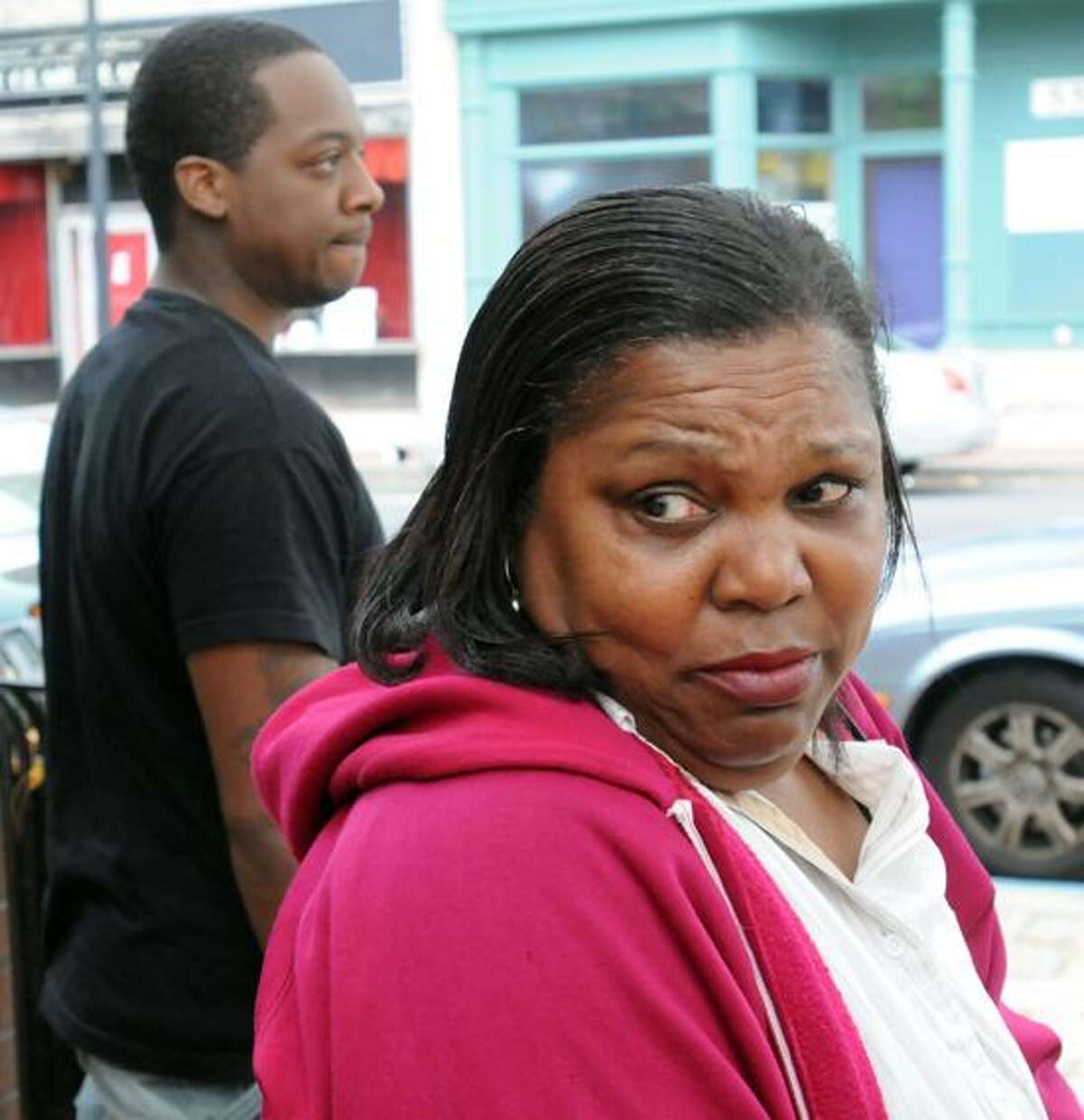 After Rita Renee Johnson was arraigned for murder at Meriden Superior Court, her alleged victim's aunt Francene Brown spoke to the media while glancing back at Johnson's friends and family. Mara Lavitt/New Haven Register