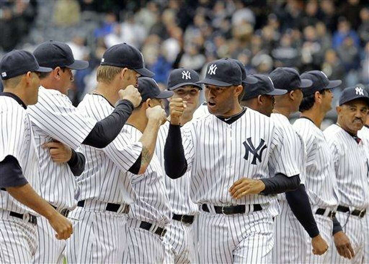 Former New York Yankees players, including Mariano Rivera, center