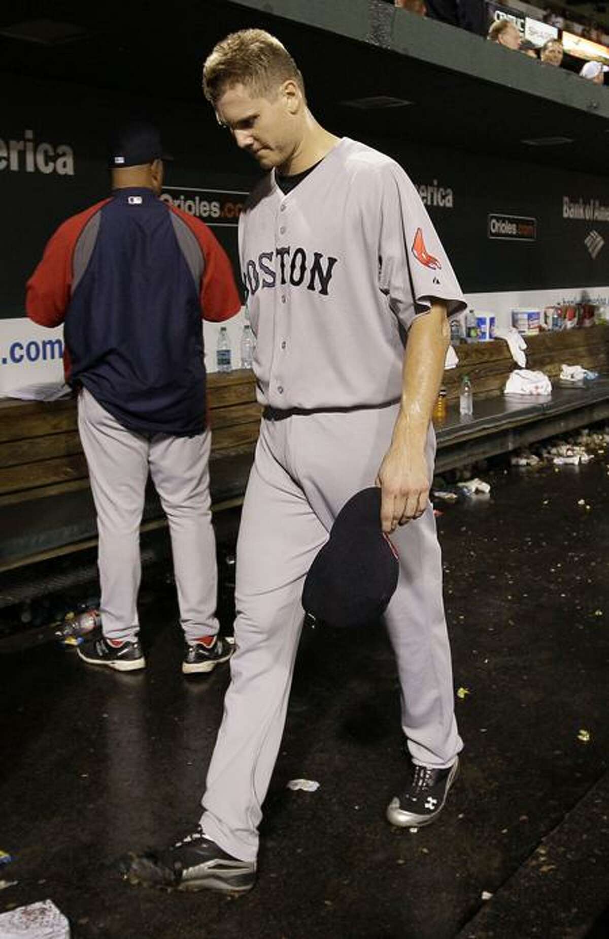 Boston Red Sox relief pitcher Jonathan Papelbon walks out of the dugout after the Red Sox's 4-3 to the Baltimore Orioles in a baseball game Wednesday, Sept. 28, 2011, in Baltimore. (AP Photo/Patrick Semansky)