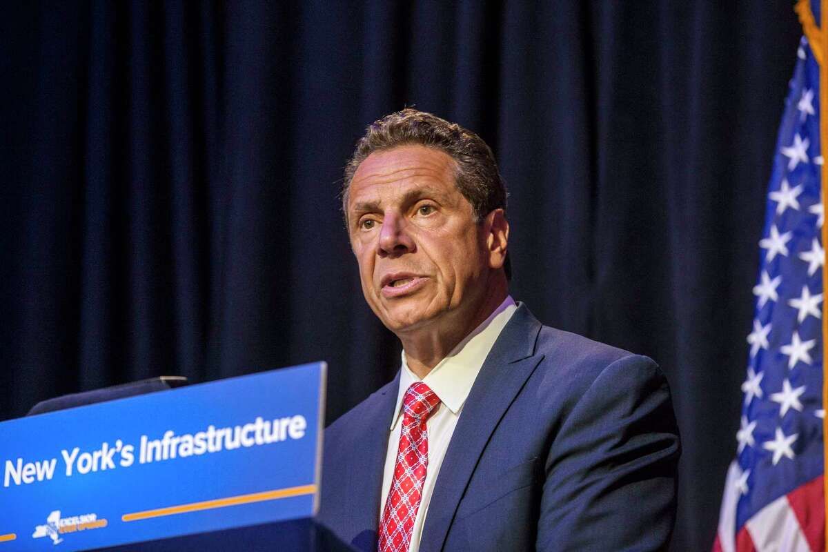 FILE -- New York Gov. Andrew Cuomo talks about improvement plans for Penn Station and the subway system at the City University of New York, in New York, May 23, 2017. Cuomo will make a rare trip to Washington on Wednesday, July 26, 2017, to meet with Democratic members of the New York congressional delegation and the transportation secretary, Elaine Chao, as New York City suffers through an ongoing transit crisis. (Hiroko Masuike/The New York Times) ORG XMIT: XNYT182