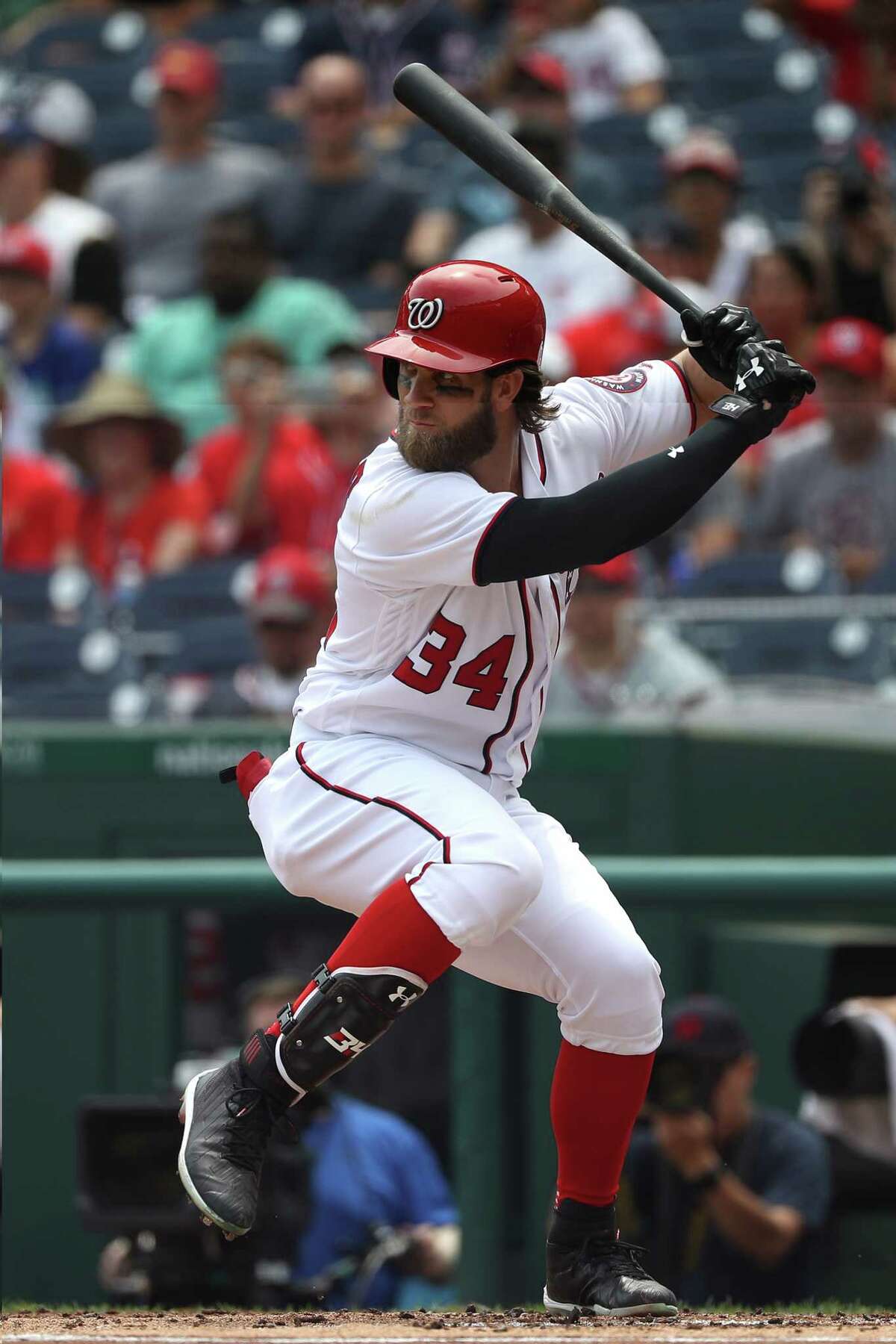 Washington Nationals left fielder Bryce Harper (34) warms up prior