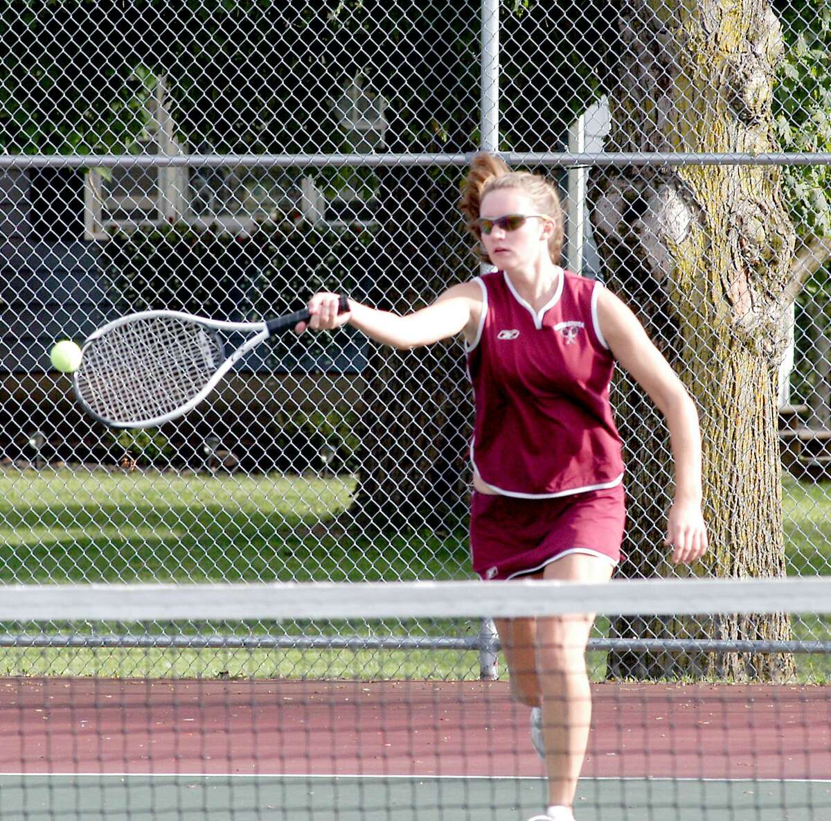 Dispatch Staff Photo by DAVID M. JOHNSONCanastota's Tracy O'Hern returns a shot from Waterville's Megan Eastman in a first singles match Monday, September 19, 2011 in Canastota. O'Hern won the match.