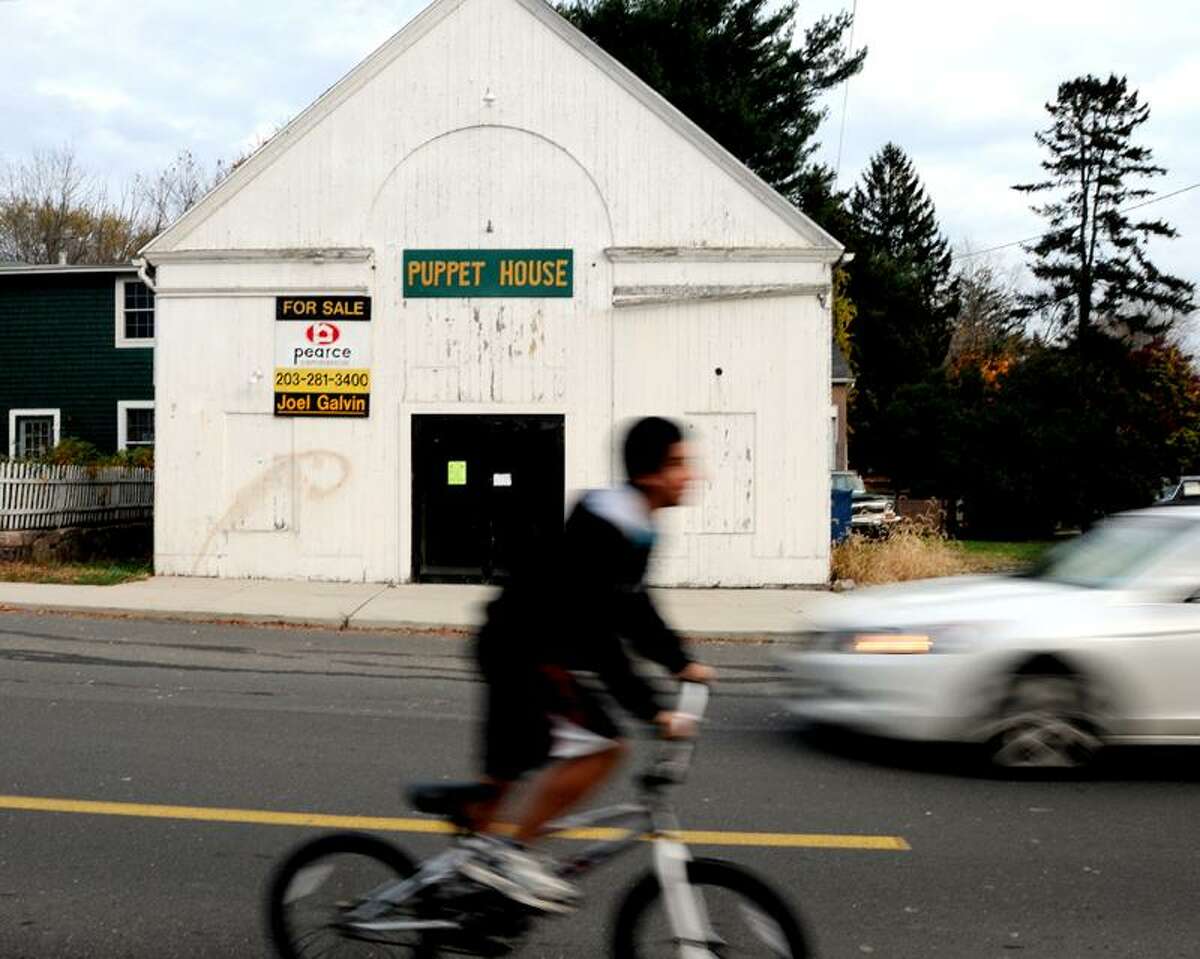 A "for sale" sign is posted on the front of The Stony Creek Puppet House at 128 Thimble Islands Road, Branford. (Peter Hvizdak/Register)