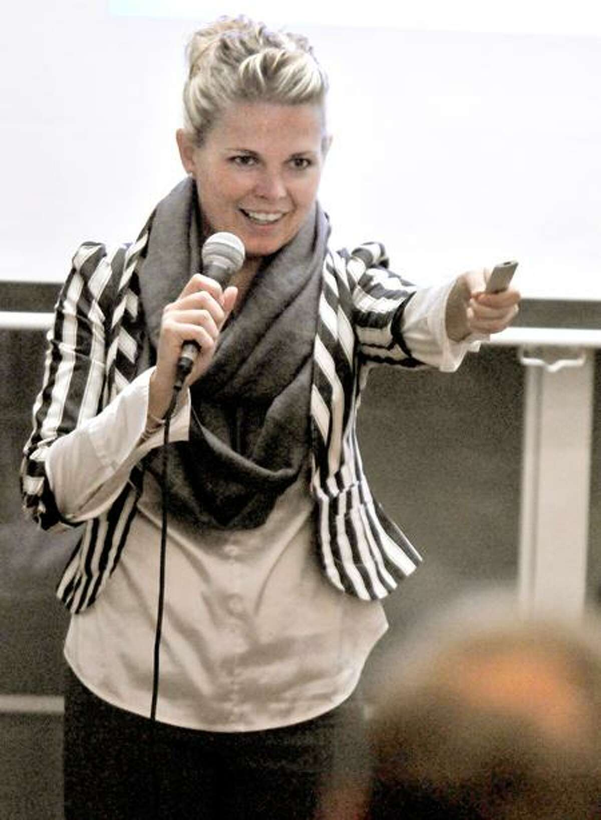 Candace Klein, founder of Bad Girl Ventures and an attorney that advises start-ups, gives the keynote speech, "The Secrets of the 3-minute pitch," to would-be entrepreneurs during the inaugural Startup Weekend New Haven event at The Grove on Orange Street in New Haven Saturday. Peter Hvizdak/Register