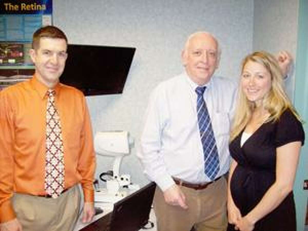 Photo Special to the Dispatch by MIKE JAQUAYS Dr. John Costello Sr., center, is joined at Costello Sr.-Allen Eye Associates by Dr. Matthew Allen, left, and Dr. Jennifer Cummings in providing quality and convenient eye care. Their office is at 578 Seneca St. in Oneida; call them at 363-4942.