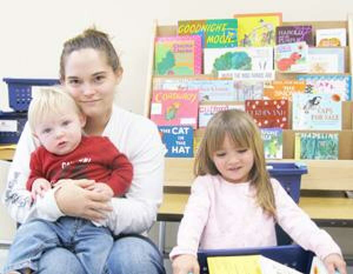 SUBMITTED PHOTO Read Ahead student Amanda Moot with her two children Sheldon and Autumn Rose. Moot earned her GED last May through the Hamilton Public Library's Read Ahead program.