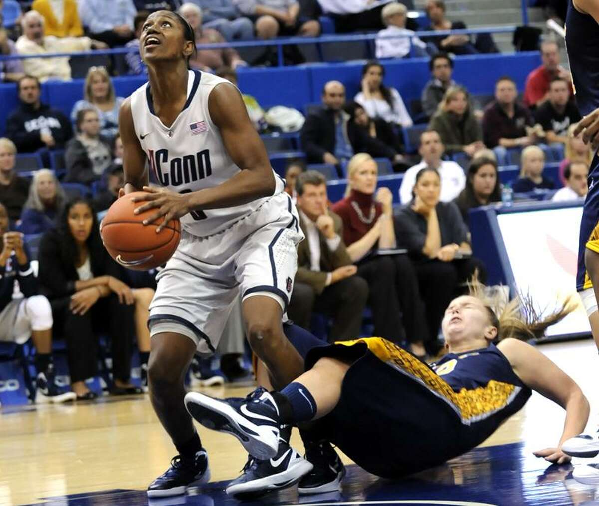 Connecticut's Tiffany Hayes looks for a shot past Pace's Margo Hackett in the second half of an exhibition NCAA college basketball game, Wednesday, Nov. 9, 2011, in Hartford, Conn. Connecticut defeated Pace 85-35. (AP Photo/Bob Child)