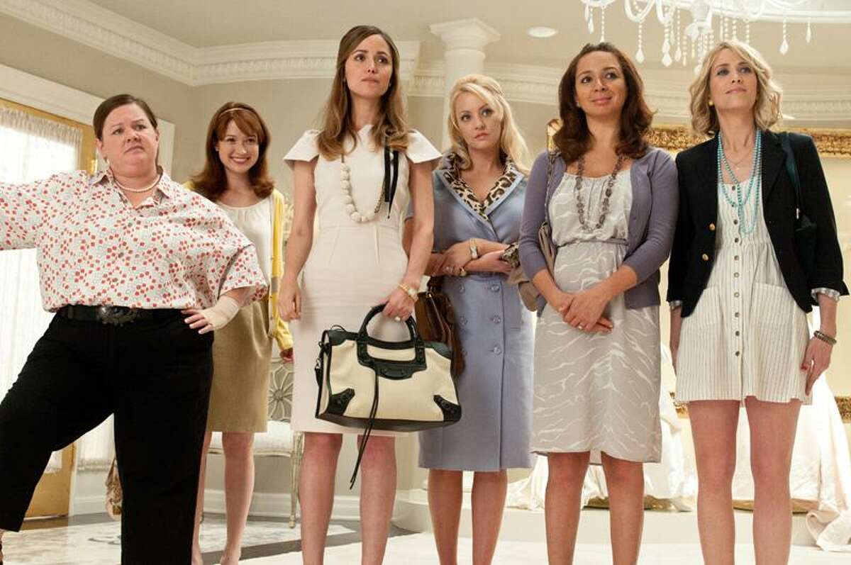 In this publicity image released by Universal Pictures, from left, Melissa McCarthy, Ellie Kemper, Rose Byrne, Wendi McLendon-Covey, Maya Rudolph and Kristen Wiig are shown in a scene from "Bridesmaids." (AP Photo/Universal Pictures, Suzanne Hanover)