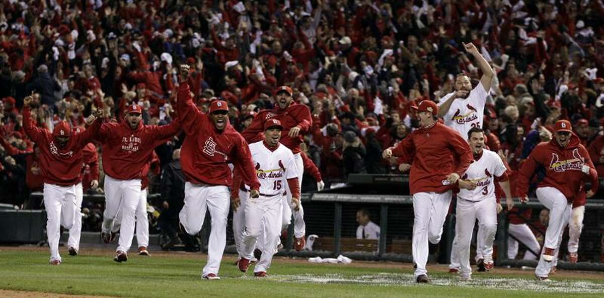 WORLD SERIES: Cardinals rally twice, win in 11, force Game 7