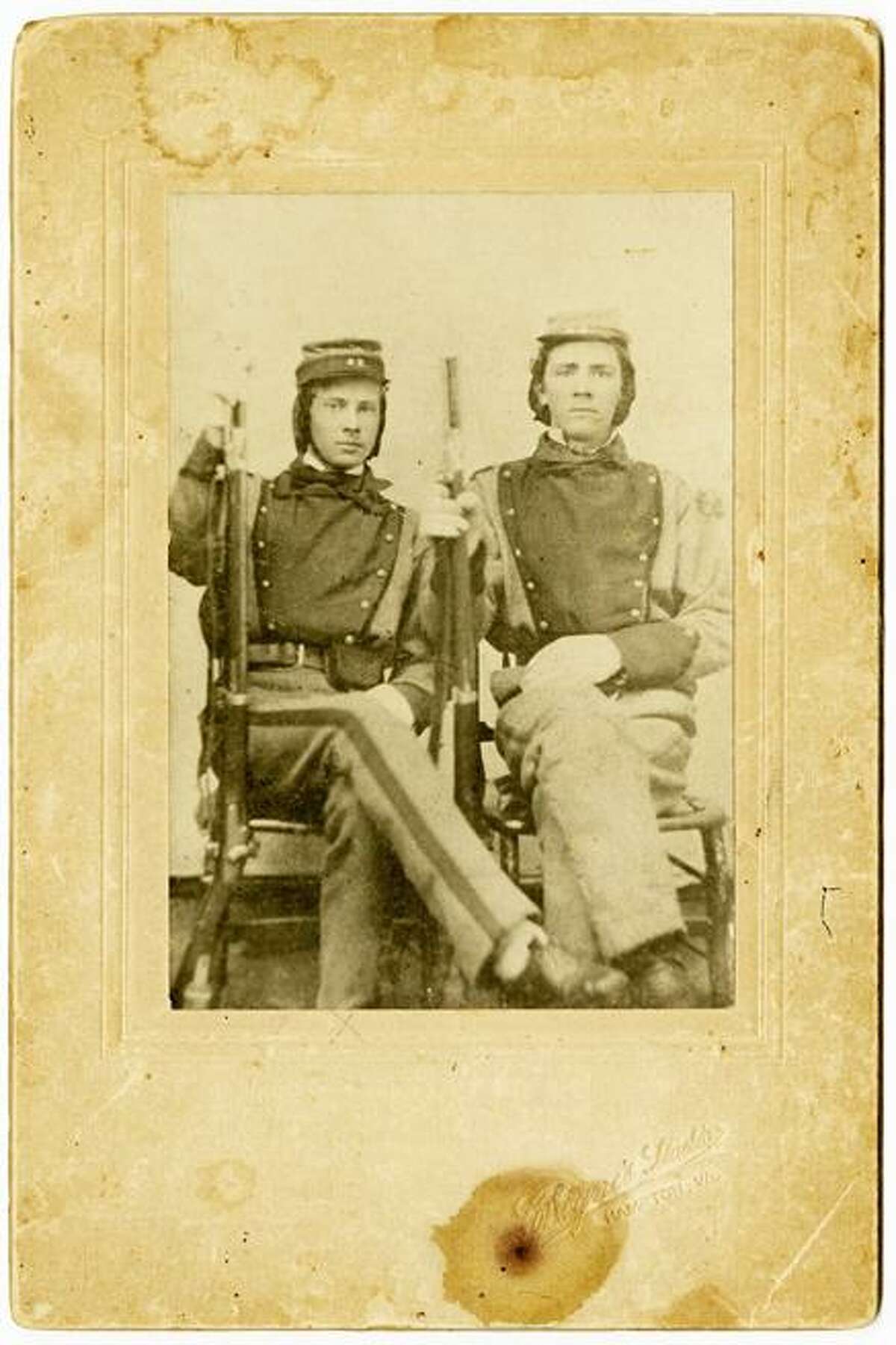 AP Photo/Courtesy of the Library of Virginia This photograph provided by the Library of Virginia shows William Henry Taylor, left, and Stephen Stewart, members of the 11th Virginia Infantry. The photograph is among the 25,000 mementoes the Library of Virginia has scanned as archivists travel the state seeking documents, letters and diaries dating to the Civil War. Virginia is among a number of states attempting to collect Civil War documents that are in the possession of families, tucked away in trunks and attics.