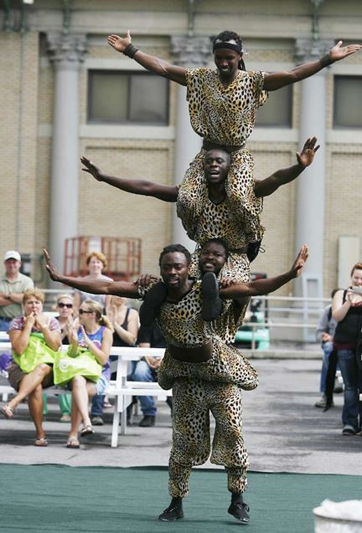 Dispatch Staff Photo by JOHN HAEGER (Twitter.com/OneidaPhoto)African Acrobats perform one of their several free shows at the New York State Fair in Geddes on opening day on Thursday, Aug. 25, 2011. The fair runs through Labor Day.