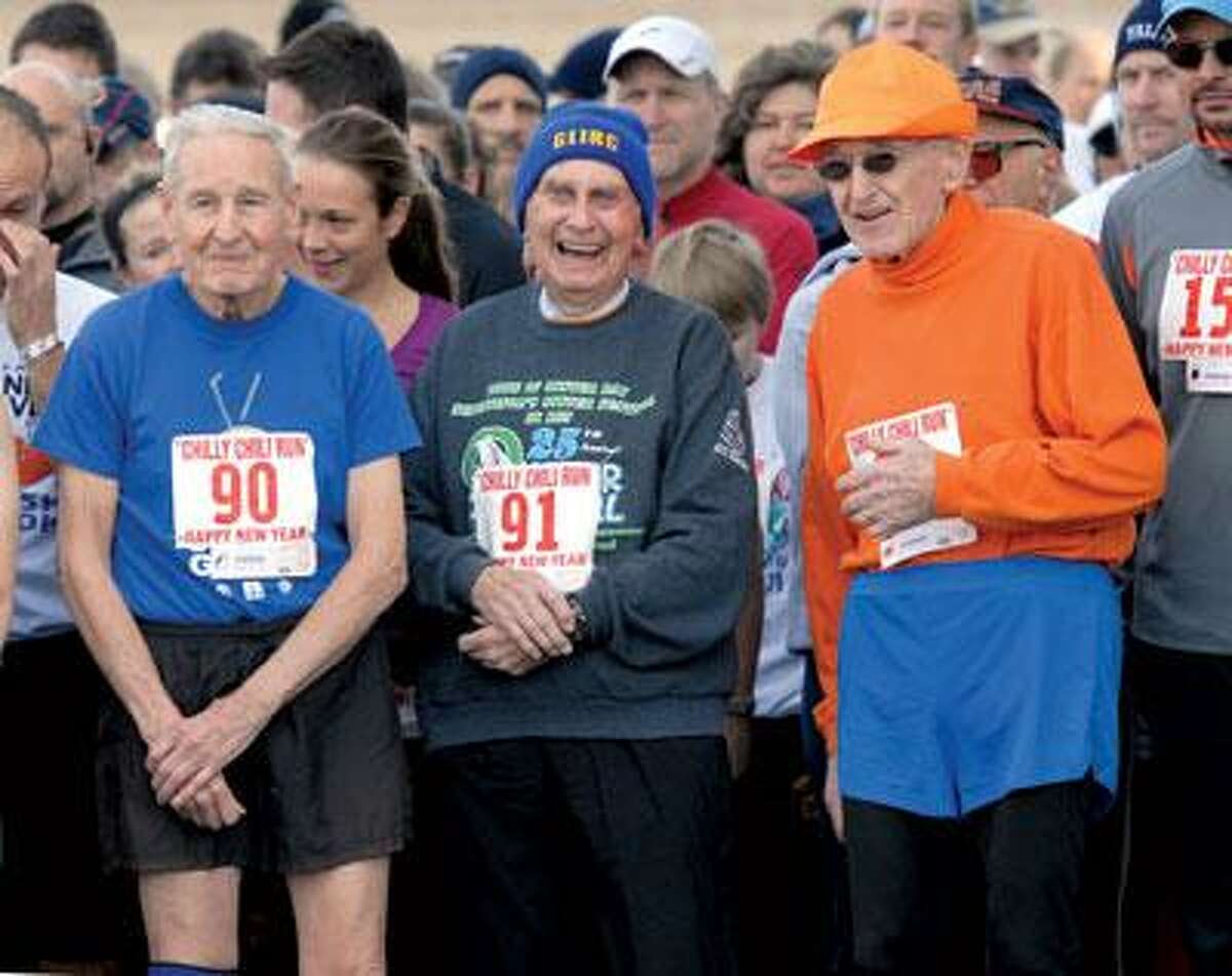 The Chilly Chili Run 5K road race in Orange featured three nonagenarian runners: From left, Bill Tribou, 90, of Granby, Bill Benson, 91, of Valley Stream, N.Y., and Dr. George "Doc" Whitney, 92, formerly of Orange and now of Brattleboro, Vt. Tribou ran it in 37 minutes, 31 seconds; Whitney ran it in 47:15 and Benson ran it in 68:26. According to race organizers, it was the first time more than one person age 90 and older ran in the same race. (Mara Lavitt/Register)