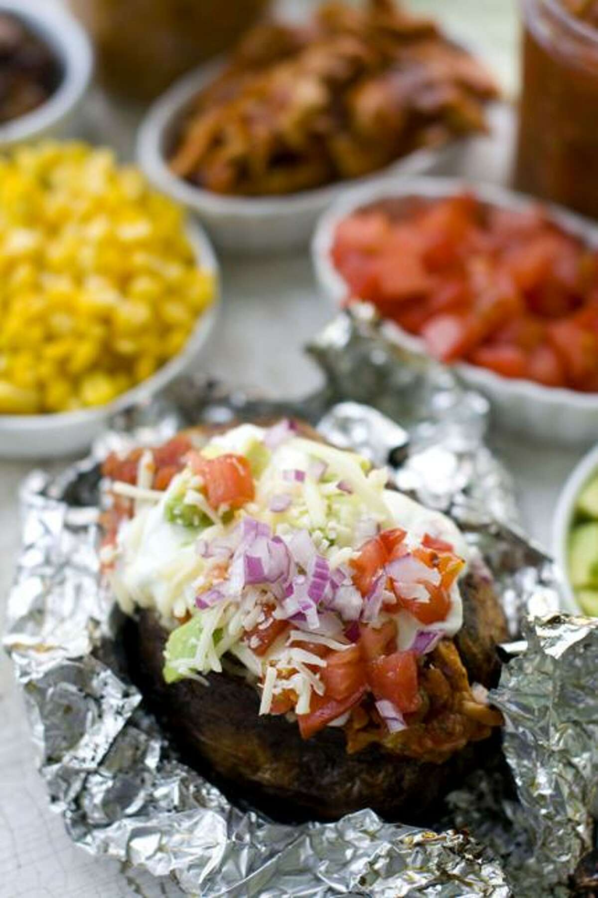 Matthew Mead/Associated Press photo: Grilled Baked Potatoes