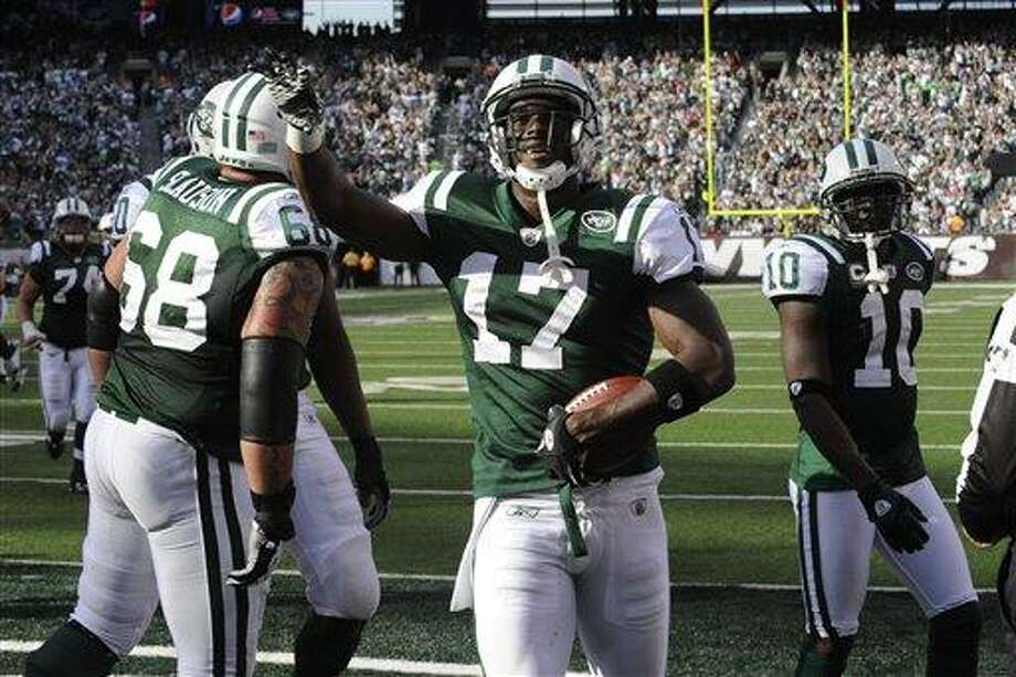 Jets Plaxico Burress Scores Three Tds In Win Over Chargers