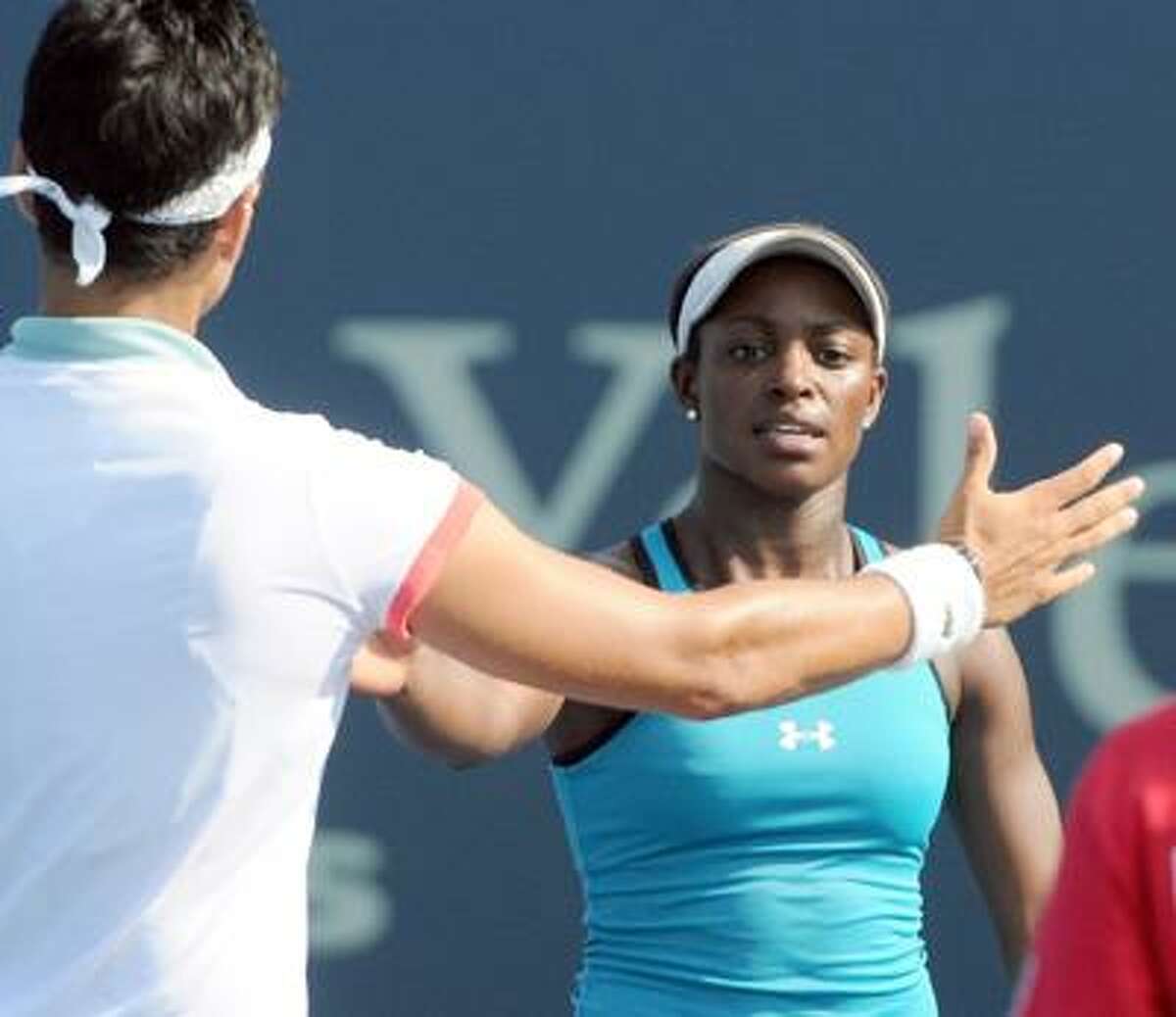 Sloane Stephens of the U.S.A, right, shakes hands with Eleni DANIILIDOU of Greece after defeating her on the Grandstand Court during the Womens Tennis Association New Haven Open Friday 8/19/11 at the Connecticut Tennis Center in New Haven. Photo by Peter Hvizdak / New Haven Registerdate ph2283 Connecticut
