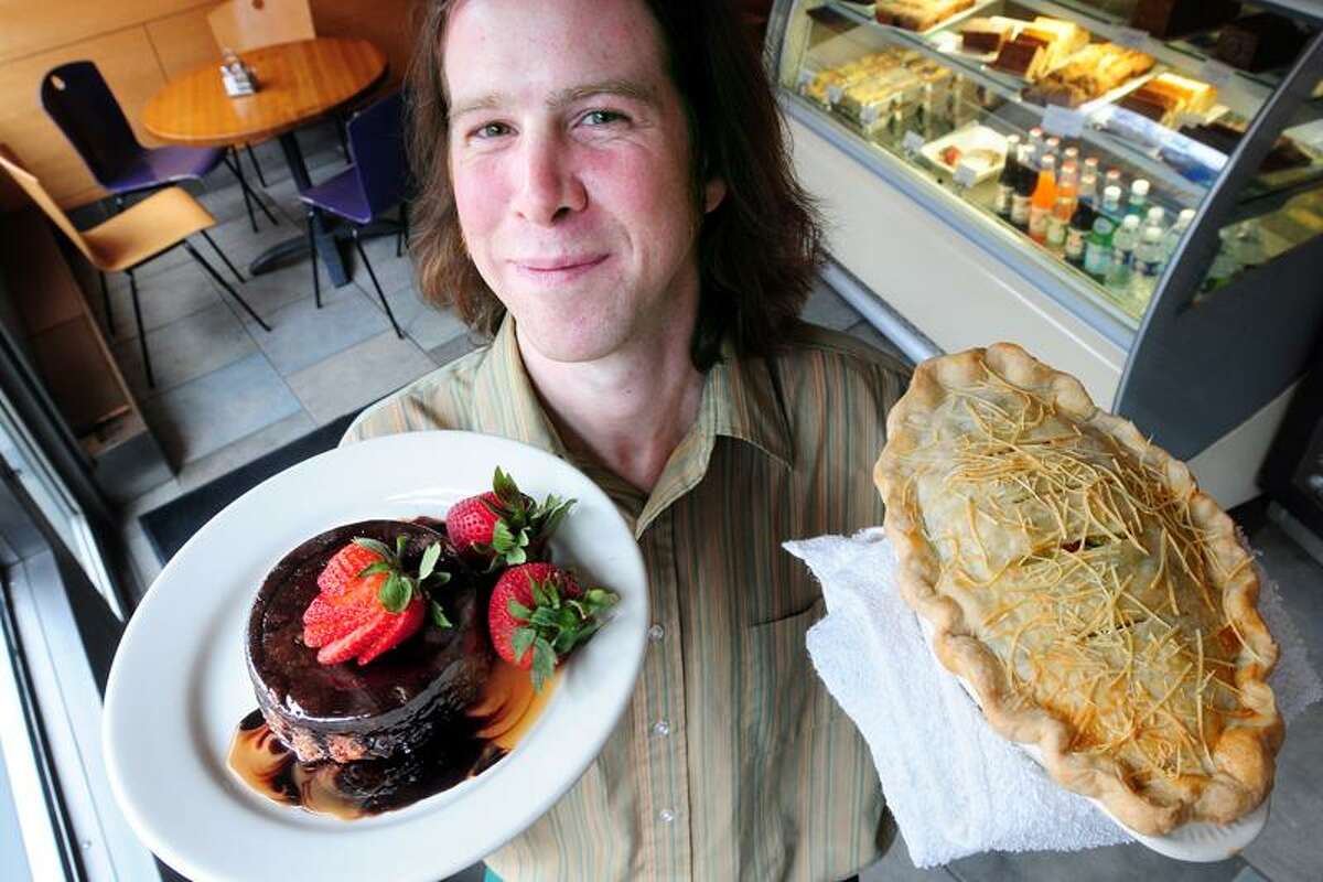 Arnold Gold/Register photo: Ben Gaffney of Atticus Bookstore Cafe in New Haven was happy to share recipes for Chocolate Bread Pudding and Chicken Potpie.
