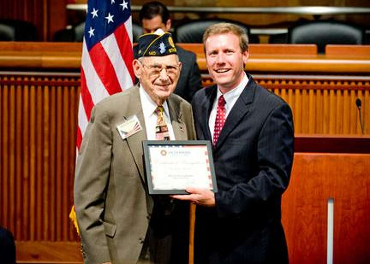 Submitted PhotoSenator David Valesky presents a certificate to Albert Paviglianti in Albany on Thursday.