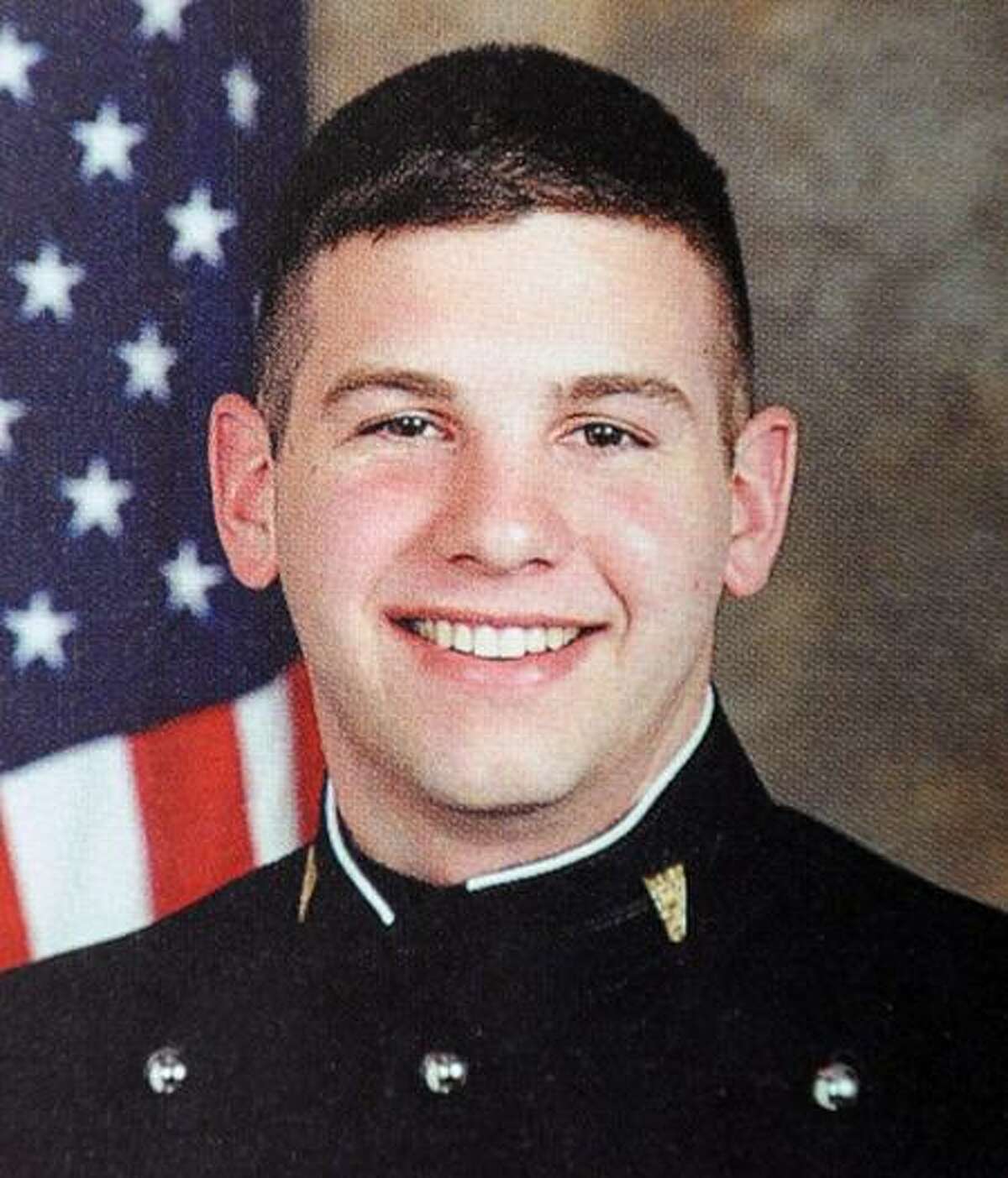 This 2001 photo released by Norwich University Aug. 8shows alumnus Brian Bill of Stamford, who was among the SEALs killed in a weekend helicopter crash in Afghanistan. (Associated Press)