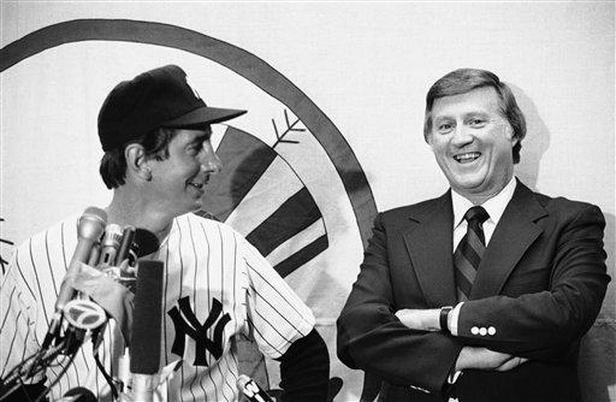 FILE - This June 29, 1978, file photo shows New York Yankees principle owner George Steinbrenner laughing as Billy Martin answers reporters questions at a news conference after the Old Timers Day game, at Yankee Stadium in New York. Both Steinbrenner and Martin will be on the Hall of Fame ballot next month. (AP Photo/Harris, File)