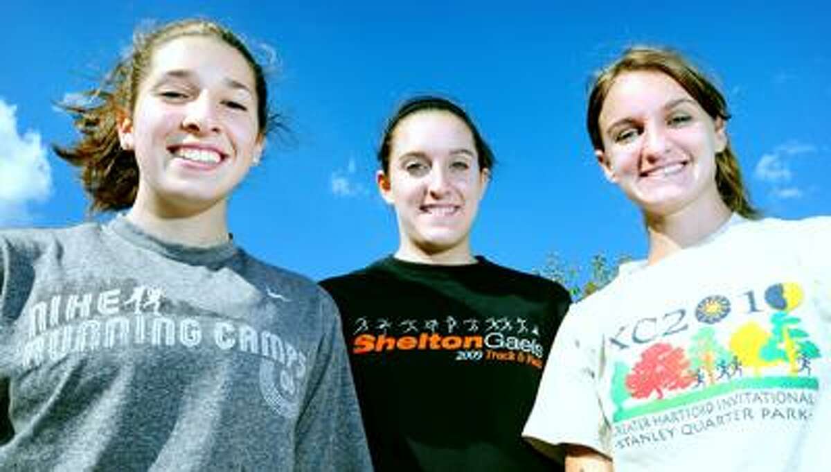From left, Shelton cross country captains Kelsey Murphy, Melissa Corraro and Kelsey Grimmer. (Arnold Gold/Register)