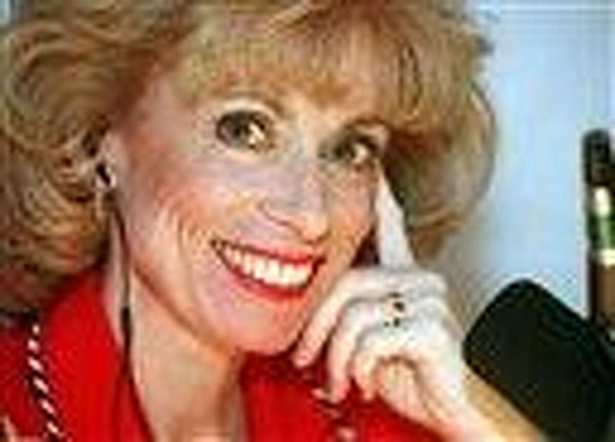 FILE - This Feb. 17, 1998 file photo shows Dr. Laura Schlessinger posing during her morning talk show in her Los Angeles studio. Schlessinger is apologizing for blurting a racial slur several times during her talk show, Aug. 10, 2010. Schlessinger wrote on her Web site that she was wrong to utter the N-word. (AP Photo/Susan Sterner, File)