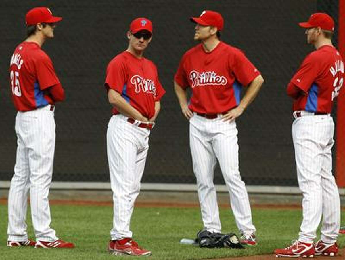 The Philadelphia Phillies and pitchers, from left, Cole Hamels, Roy Oswalt, Brad Lidge and Roy Halladay will take on the San Francisco Giants, a team with great pitching as well, in the National League championship series. (Associated Press/Matt Rourke)