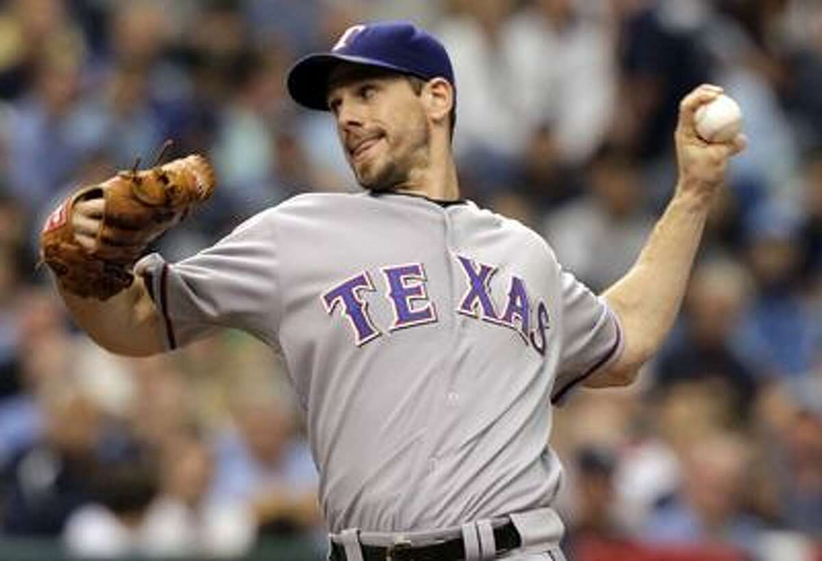Cliff Lee went the distance Tuesday night, shutting down the Rays, and the Texas Rangers advanced through the ALDS to take on the Yankees in the ALCS. (AP file photo)