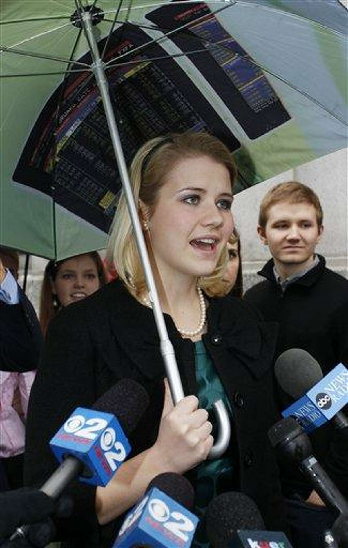 Elizabeth Smart speaks to the media following the guilty verdict in the Brian David Mitchell trail outside the federal court house Friday, Dec. 10 2010 in Salt Lake City. Mitchell was found guilty for the June 5 2002 kidnapping of Elizabeth Smart. (AP Photo/Colin E Braley)
