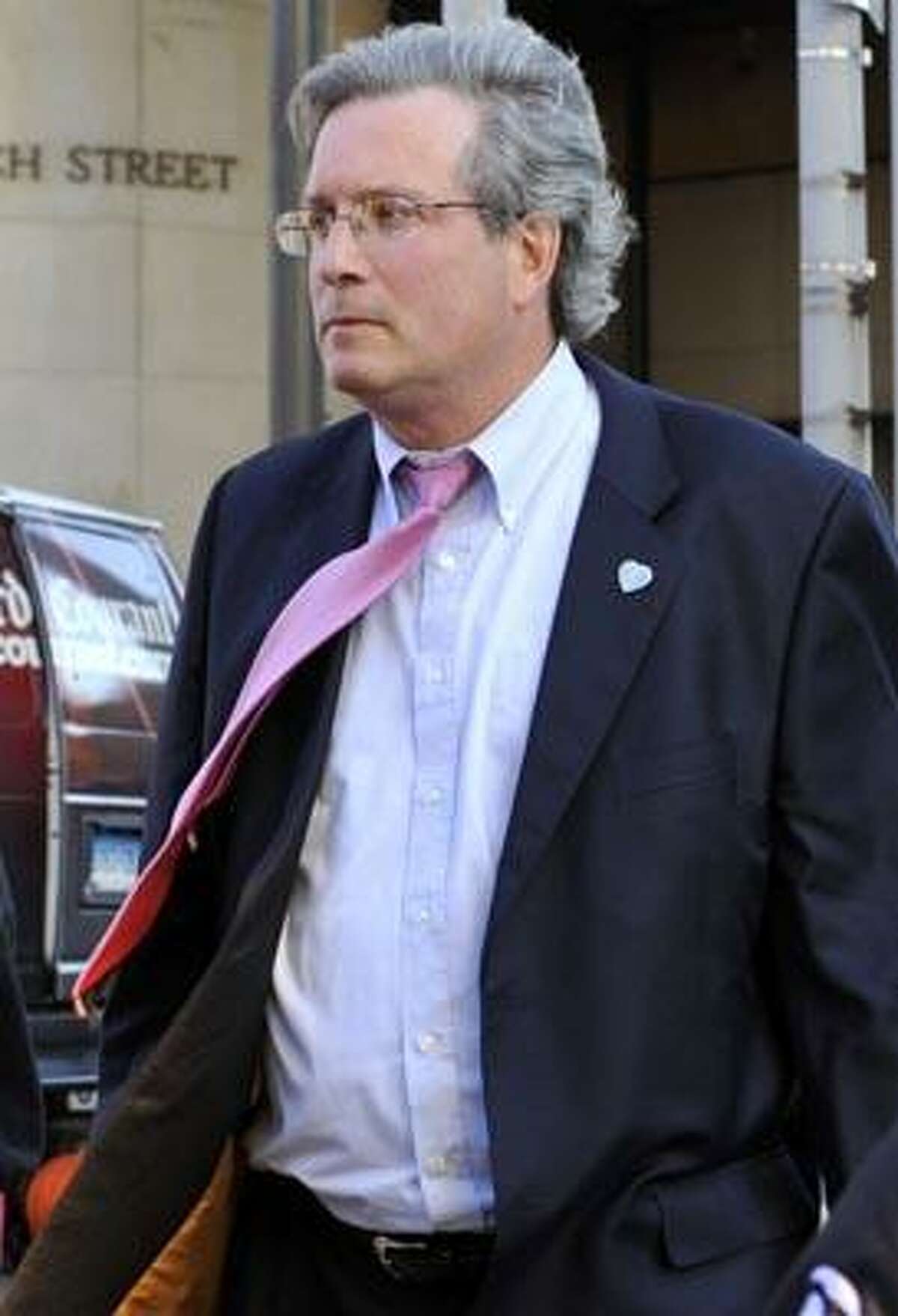 Dr. William Petit Jr. leaves Superior Court in New Haven, Conn., after the sentencing of Steven Hayes, Thursday, Dec. 2, 2010. Hayes has been convicted and sentenced to death for the murder of Petit's wife, Jennifer Hawke-Petit, and two children, Hayley and Michaela. (AP Photo/Jessica Hill)