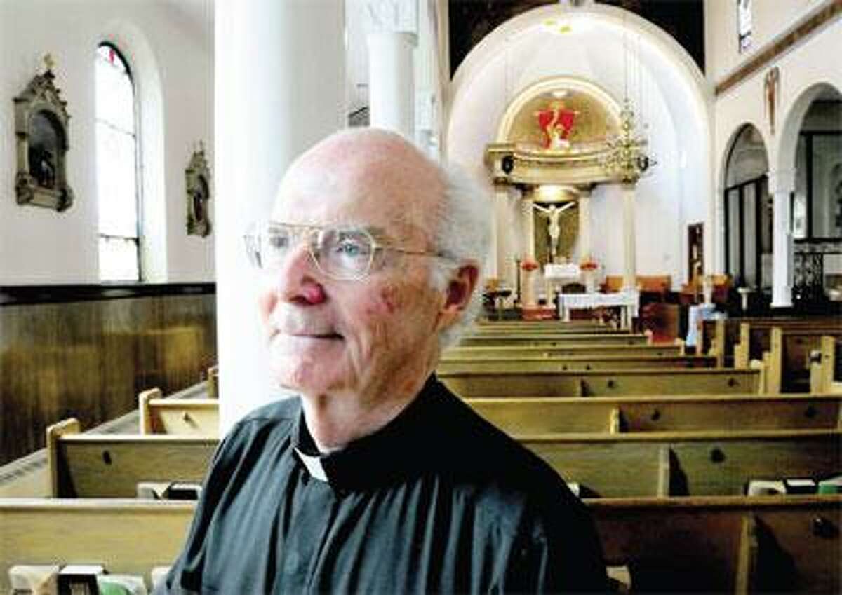 The Rev. John J. Keane has led the St. Ann's Church parish since 2004. (Arnold Gold/Register)