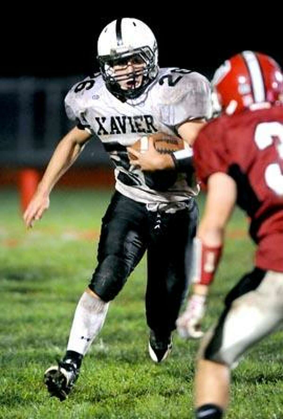 Mike Mastrioanni of Xavier runs against Cheshire in the second half at Cheshire on 10/1/2010.Photo by Arnold Gold AG0386D