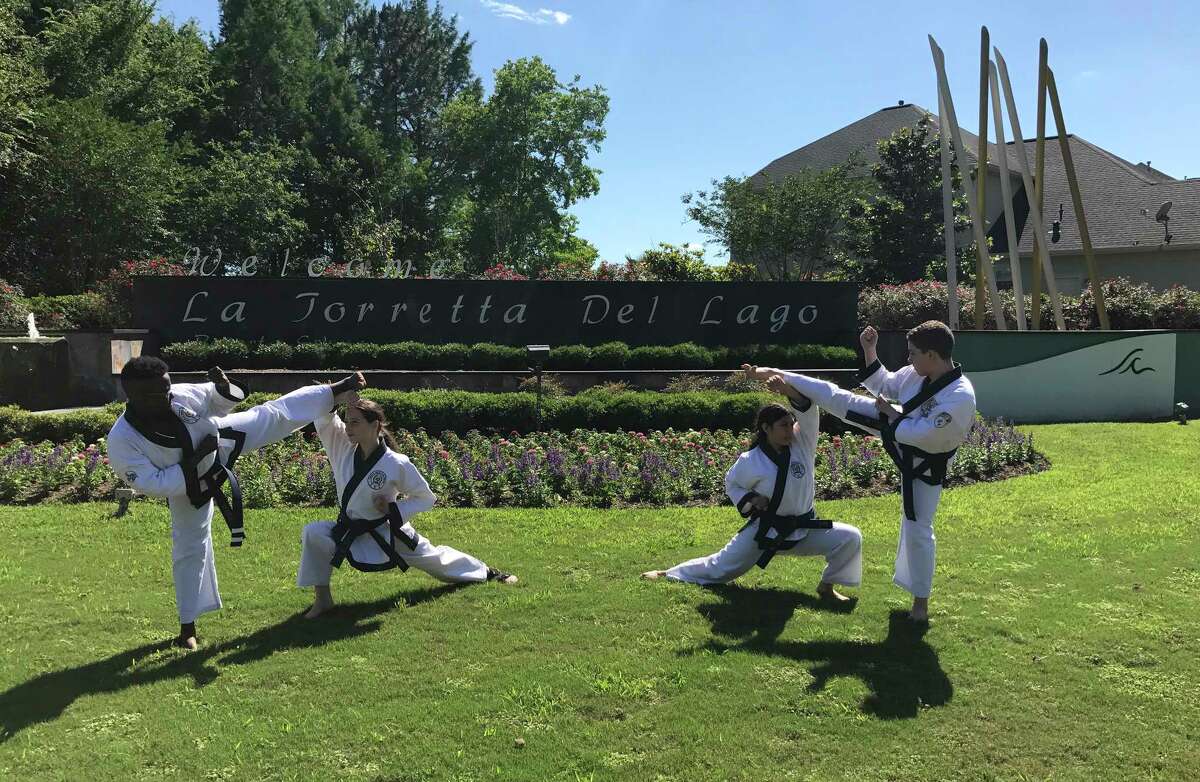 Pictured from left are Devin Allison, from Carthage, Texas, Leighanna Edwards, Nadia Borja and Robert Ackerly all from Montgomery preparing for the Soo Bahk Do Moo Duk Kwan 2017 National Championship Tournament which will take place Aug. 10-12 at La Torretta Lake Resort on Lake Conroe.