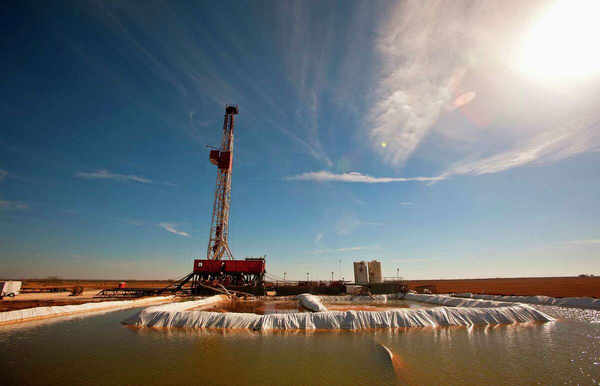 FILE - This Feb. 17, 2016, file photo shows a water pool attached to Robinson Drilling rig No. 4 in Midland County, Texas. Ken Medlock, director of an energy-studies program at Rice University in Houston, says an assessment Tuesday, Nov. 15, 2016, by the U.S. Geological Survey that the Wolfcamp Shale in the Midland region could yield 20 billion barrels of oil is another sign that "the revival of the Permian Basin is going to last a couple of decades." (James Durbin/Reporter-Telegram via AP, File