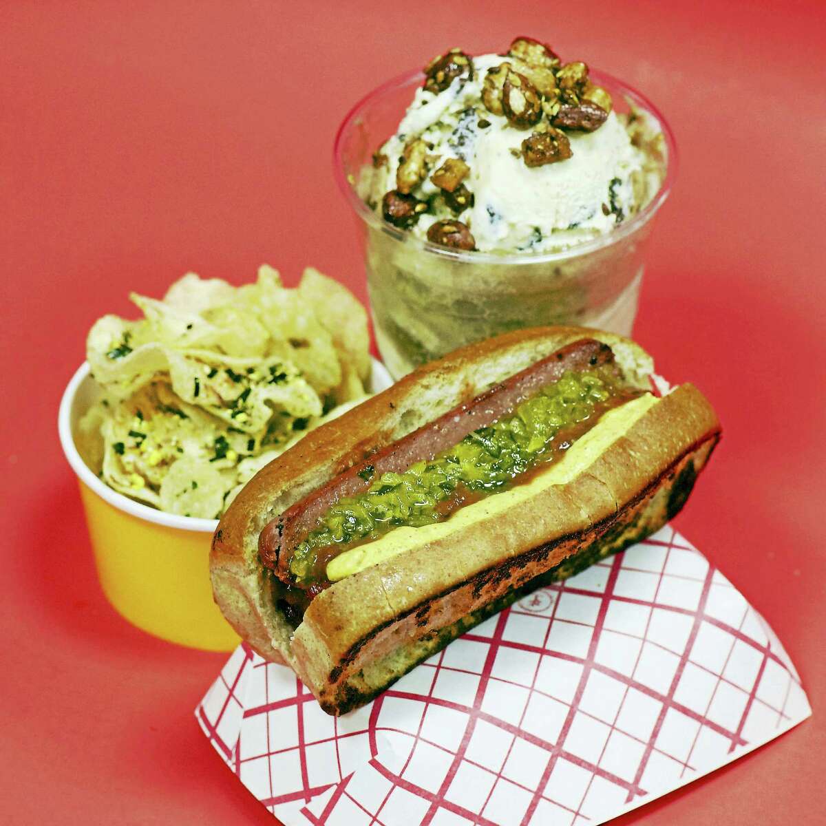 A grilled dog with hot pepper relish and spicy brown mustard (inspired by Blackie’s of Cheshire); kettle chips with furikake and vinegar; and a float with Foxon Park root beer, Ashley’s ice cream, and almond brittle.