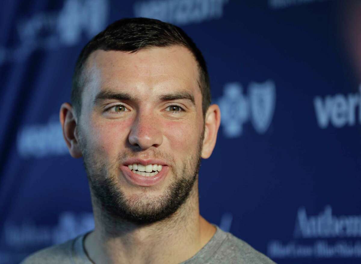 Indianapolis Colts' Andrew Luck talks with media after arriving for NFL football training camp, Saturday, July 29, 2017, in Indianapolis. (AP Photo/Darron Cummings)
