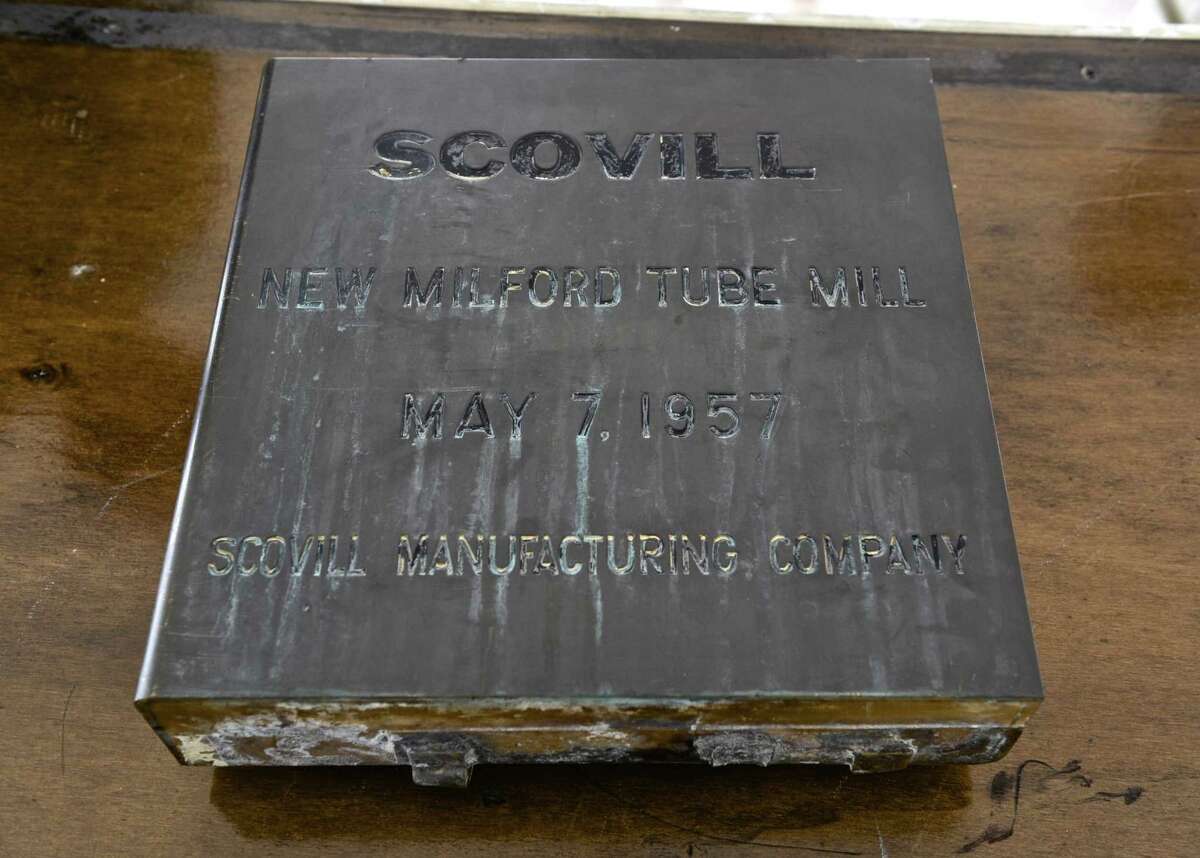 A time capsule from the Scovill (Century Brass) building was opened during the Village Fair Days in New Milford, on Saturday. The capsule, from 1957, was recovered by the public works department before the demolition of the building. July 29, 2017, in New Milford, Conn.
