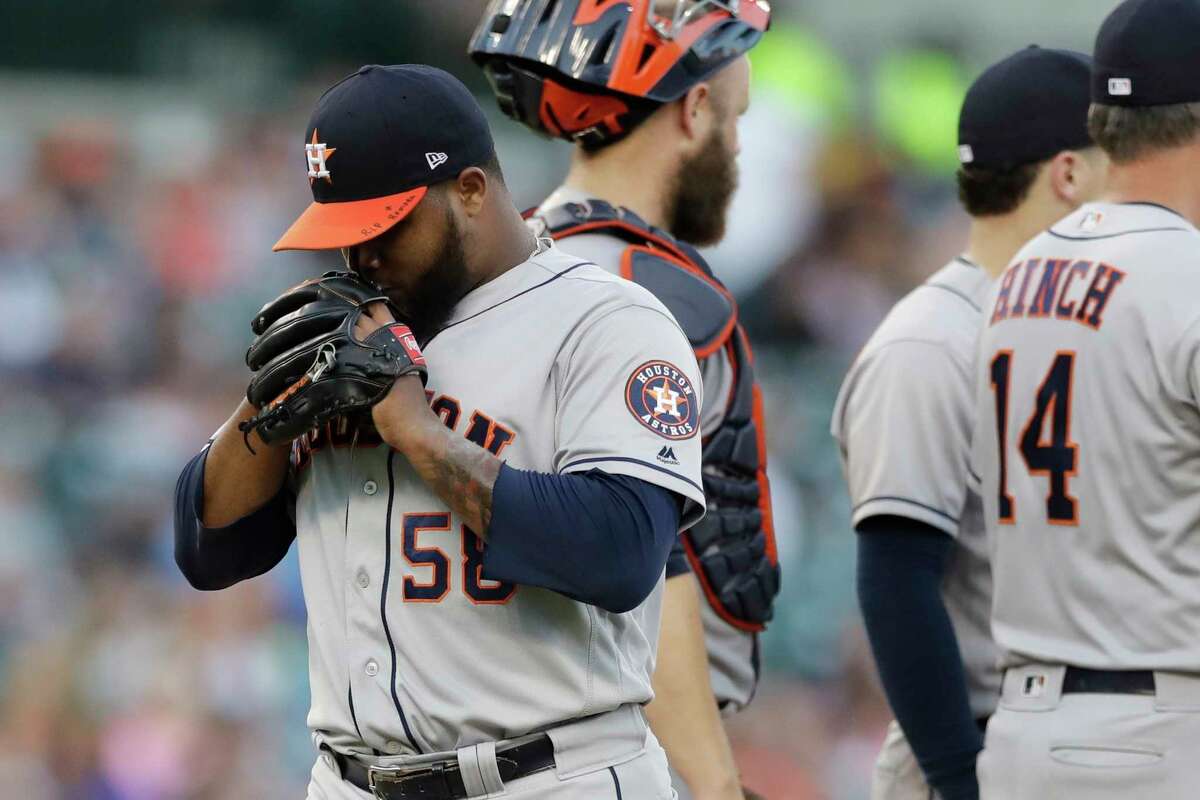 Houston Astros relief pitcher Francis Martes walks off the mound after being relieved during the seventh inning of a baseball game against the Detroit Tigers, Saturday, July 29, 2017, in Detroit. (AP Photo/Carlos Osorio)