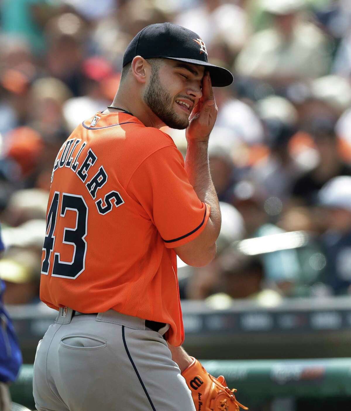 Houston Astros starting pitcher Lance McCullers Jr. wipes his face after being relieved during the sixth inning of a baseball game against the Detroit Tigers, Sunday, July 30, 2017, in Detroit. (AP Photo/Carlos Osorio)