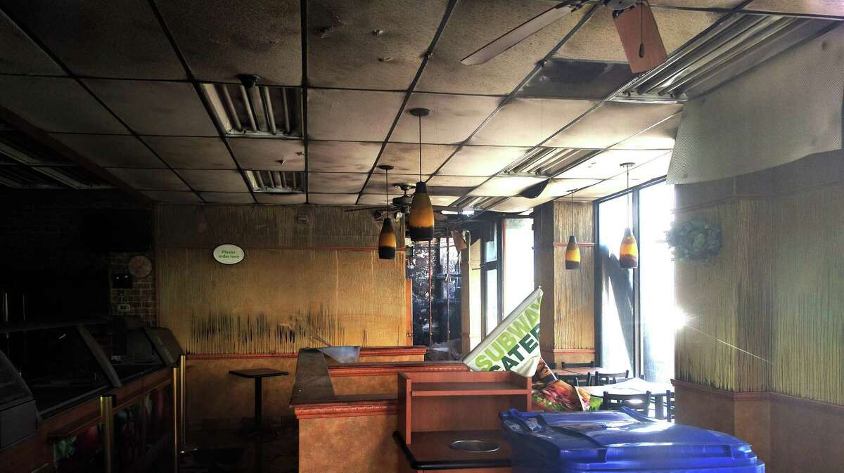 The downtown Subway sandwich shop was damaged by a fire started in the trashbin outside, according to the owner. Bridgeport, Conn., July 31, 2017.