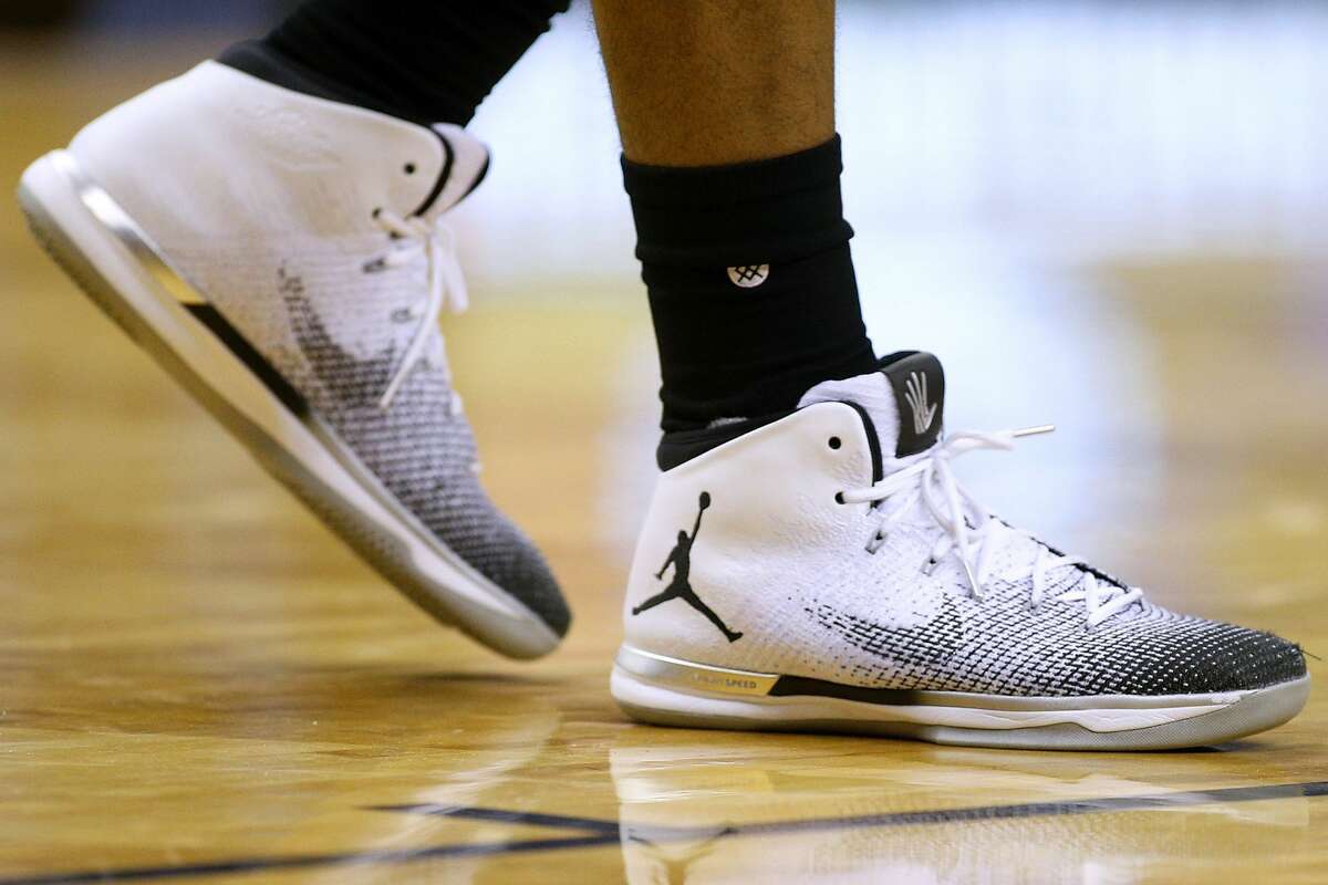 NEW ORLEANS, LA - JANUARY 27: Nike shoes are seen worn by Kawhi Leonard #2 of the San Antonio Spurs during the second half of a game against the New Orleans Pelicans at the Smoothie King Center on January 27, 2017 in New Orleans, Louisiana. NOTE TO USER: User expressly acknowledges and agrees that, by downloading and or using this photograph, User is consenting to the terms and conditions of the Getty Images License Agreement. (Photo by Jonathan Bachman/Getty Images)