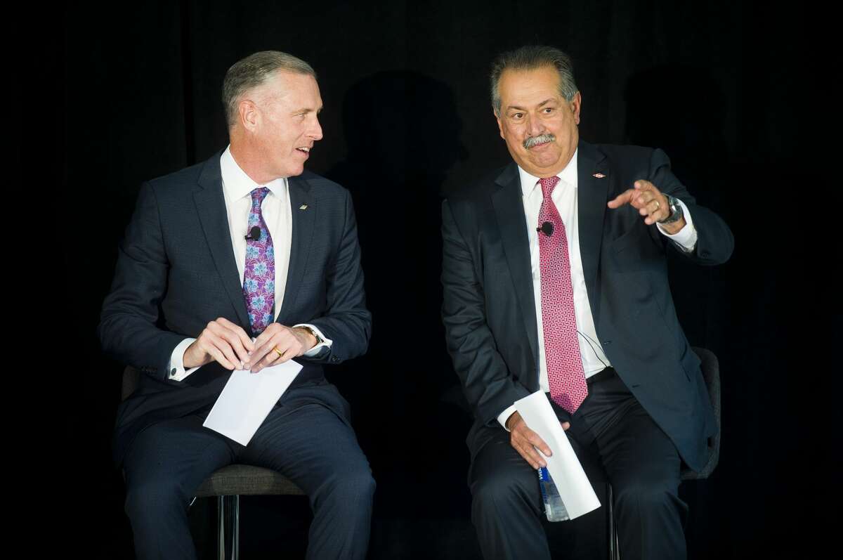 Dow President and COO Jim Fitterling, left, and Chairman and CEO Andrew Liveris chat during a groundbreaking event for a new innovation center at 2200 W. Salzburg Road on Monday, July 31, 2017 in Auburn.