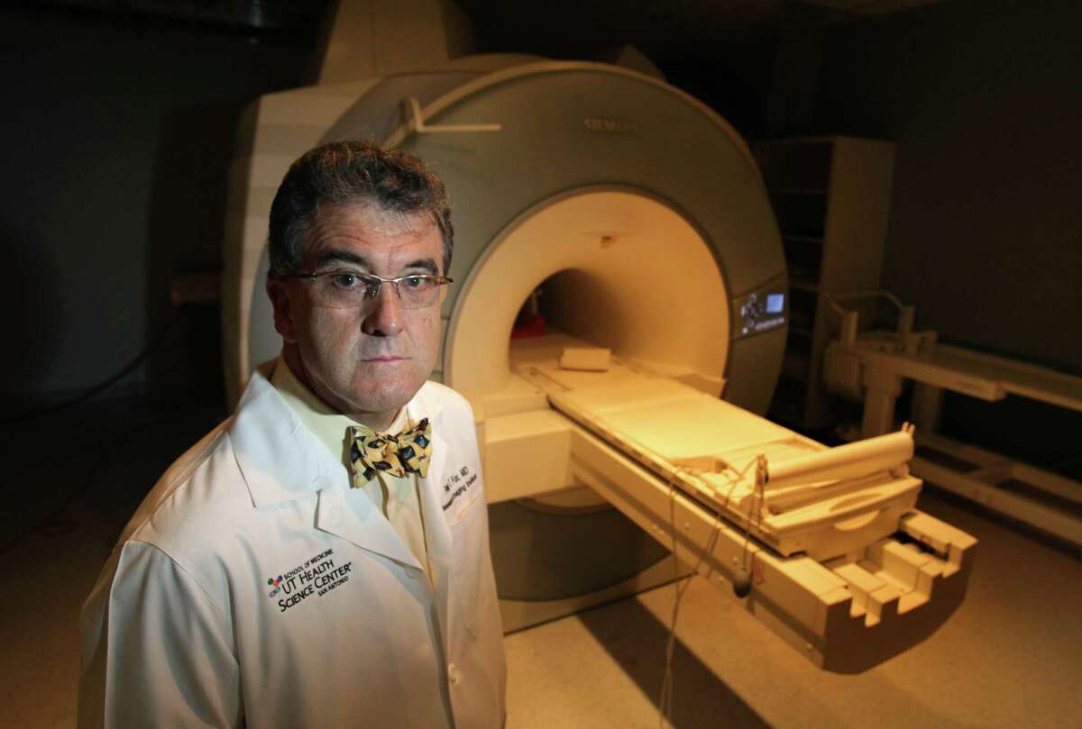 Dr. Peter T. Fox, director of the Research Imaging Institute at UT Health San Antonio, shown here in 2012, has published a new scientific paper based on brain scans that suggest children who have had oxygen deprivation-related brain injuries might experience “locked-in syndrome,” where they are aware of their environment but unable to interact with it.