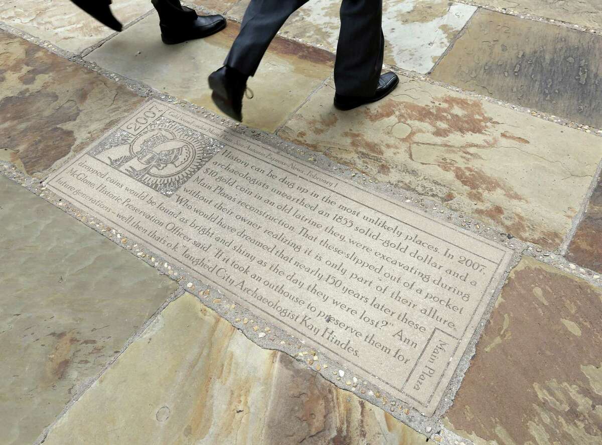 Engraved stones on the grounds of the Bexar County Courthouse, including this one seen June 28, offer up odd little news tidbits from history.