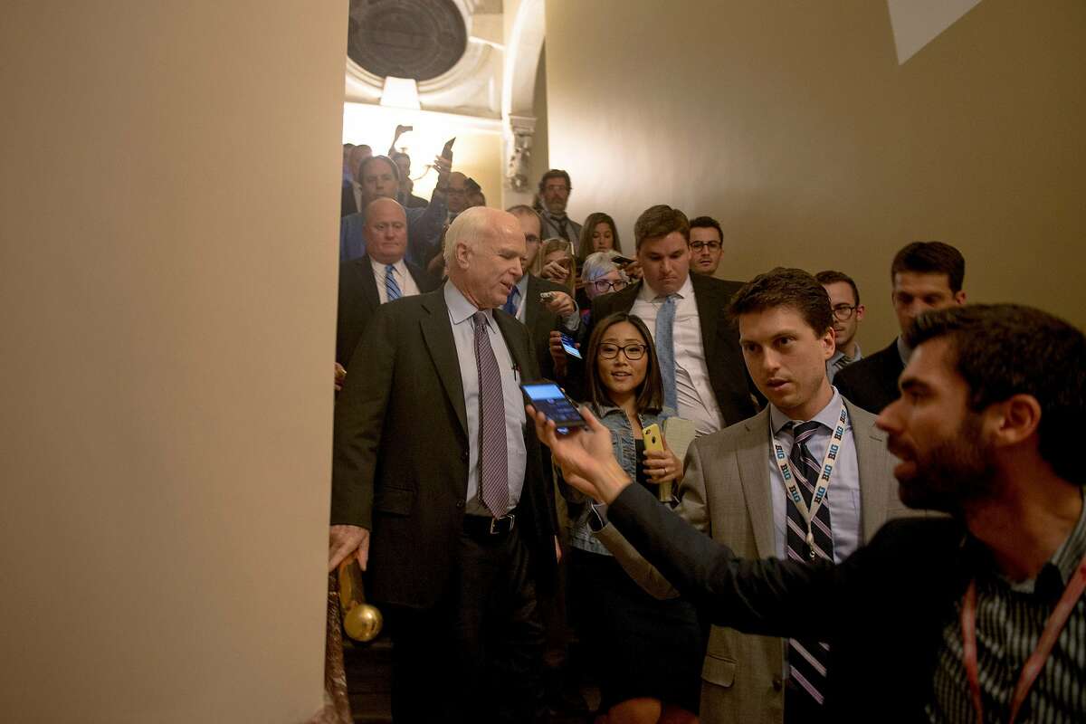 Sen. John McCain (R-Ariz.) speaks to reporters after voting against a slimmed-down Affordable Care Act repeal measure on Capitol Hill, in Washington, in the early morning hours on July 28, 2017. The party�s senators trimmed their vision of a bill to repeal the health law, but McCain and two other Republicans turned on the bill in the dead of night. (Gabriella Demczuk/The New York Times)
