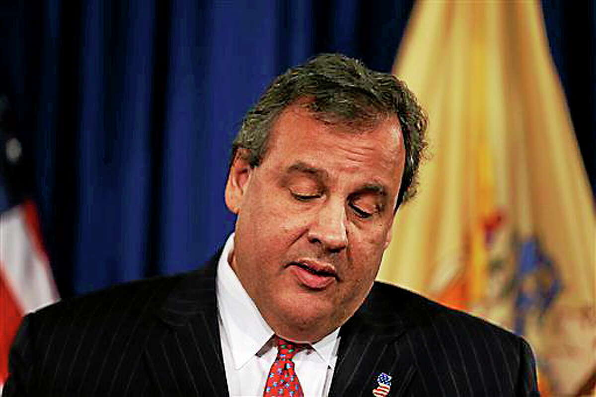 New Jersey Gov. Chris Christie speaks during a news conference Thursday, Jan. 9, 2014 at the Statehouse in Trenton. N.J. Christie has fired a top aide who engineered political payback against a town mayor, saying she lied. Deputy Chief of Staff Bridget Anne Kelly is the latest casualty in a widening scandal that threatens to upend Christie's second term and likely run for president in 2016. Documents show she arranged traffic jams to punish the mayor, who didn't endorse Christie for re-election. (AP Photo/Matt Rourke)