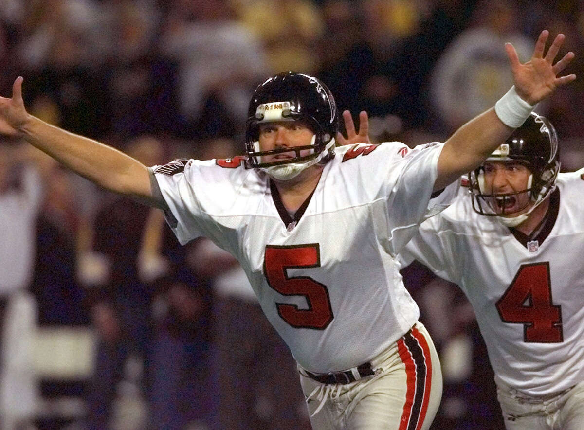 FILE - In this Jan. 17, 1999, file photo, Atlanta Falcons kicker Morten Andersen (5) and holder Dan Stryzinski (4) celebrate Andersen's 39-yard field goal to give Atlanta a 30-27 overtime win over the Minnesota Vikings in the NFC Championship in Minneapolis. Andersen, who began his NFL career with the New Orleans Saints in 1982, enters the Pro Football Hall of Fame as the leading scorer in NFL history with 2,544 points. He played in a record 382 games during his 25-year career. (AP Photo/Ed Reinke, File)